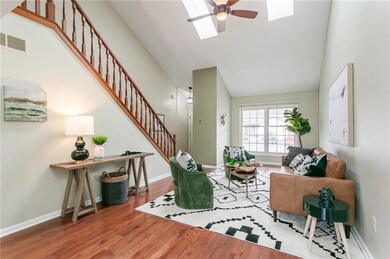 Two skylights let in wonderful light! Hardwood flo