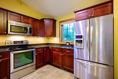 Kitchen featuring stainless steel appliances, ligh