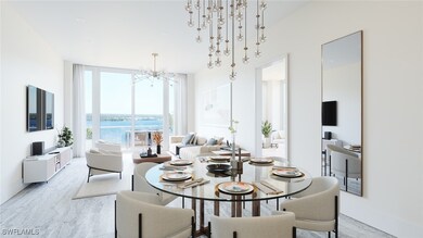 Dining area with a notable chandelier and a wall o