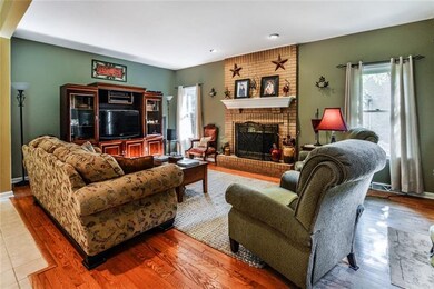 Enjoy the open and bright family room with gas fir