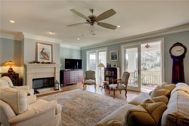 The great room opens to the large covered porch an