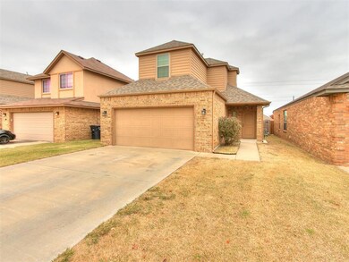 View of front of house featuring a garage and a fr