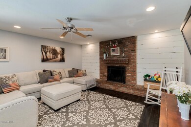 Family room with wood burning fireplace