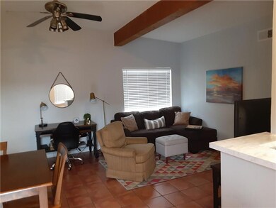 Living room with visible vents, tile patterned fl