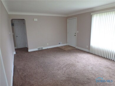 Large living room with plenty of light