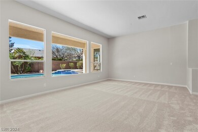Formal living area with beautiful view of the pool
