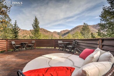 Wooden terrace with a mountain view and outdoor lo