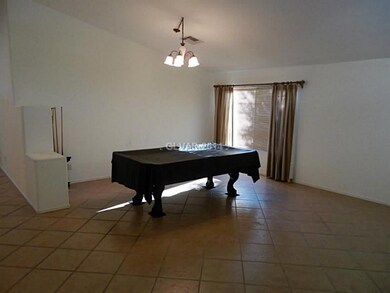 Living Room. Pool table included in rent price (ma