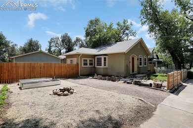 View of the front driveway. There is a double gate