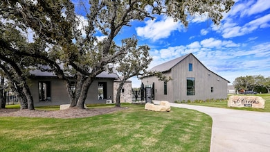 Modern farmhouse with a front lawn