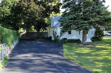 Driveway is well maintained, yard is fully fenced.