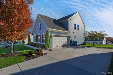 View of home's exterior with a yard