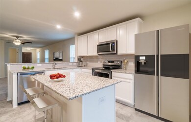 Island kitchen *Photos of furnished model. Not act