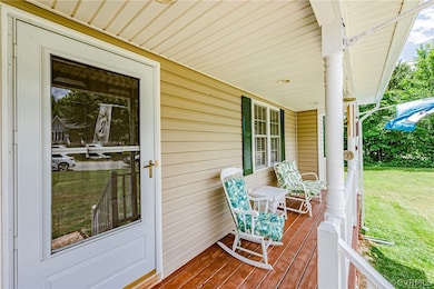 View of front of house with a garage, a front yard