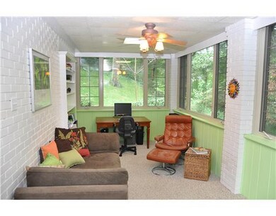 Sunroom. WARM, COMFORTABLE AREA TO ENJOY