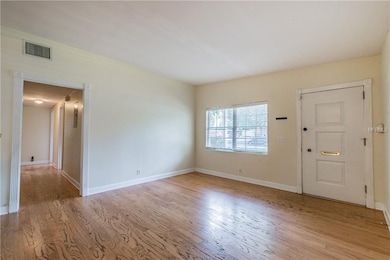 Facing front door in living room