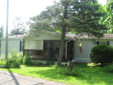 The house is located on a quiet shaded corner of H