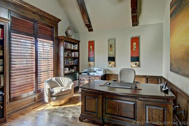 Handsome Study offers hand-hewn wood beams spannin