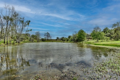 Pond is sourced by it's own water well, powered by