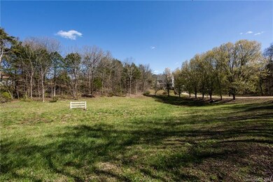 over 3 acres of private wooded yard!