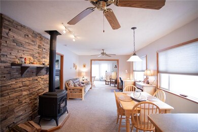 Dining room / family room combo with cozy gas stov