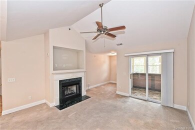 Great Room with vaulted ceiling, ceiling fan and g