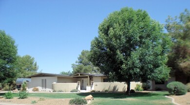 Large corner lot with mature landscaping