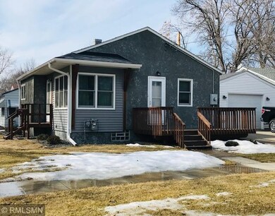Newer vinyl siding and windows in the main level.