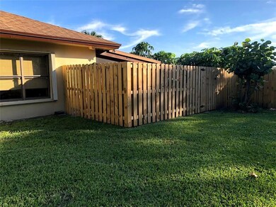 New wood fence installed by the association.