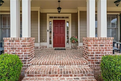 Doorway to property with a porch