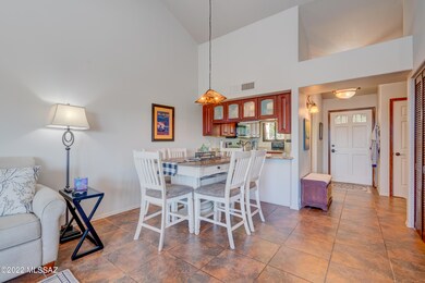 Dining toward front entry & kitchen