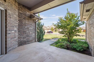 Porch featuring a residential view and a yard
