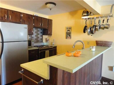Kitchen. Kitchen also features handy breakfast bar