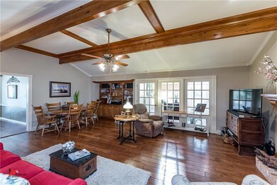 View of Den from entry.  Solid wood Floors, Tray c