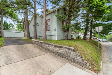 Off street parking leading to detached garage