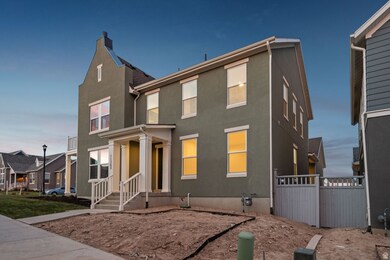 View of front of home with a residential view and stucco siding