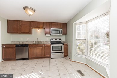 10110 Walnut Wood Ct, Burke, VA 22015 - photo 6