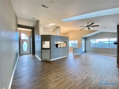 Spacious condo with vaulted ceilings & new floorin
