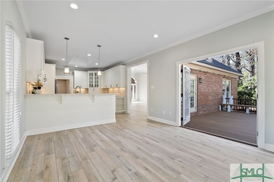 Kitchen w/Stainless Steel Appliances, White Shaker