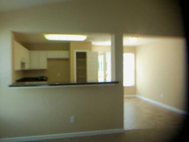 Open space from great room to kitchen and dining area