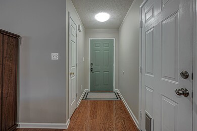 Enter from the garage to the hall.