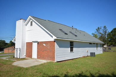 Side of home with entrance