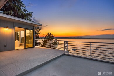 The upper deck highlighted here: sizable and open to the elements. It is rare along the local waterfront to enjoy such extensive decks (found on each level). Truly the ideal place for future plantings like tomatoes & vegetables, herbs, potted trees, and lounging chairs.