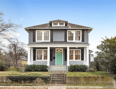 View of front of home featuring covered porch