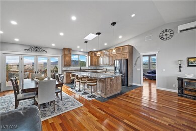 Kitchen featuring a wealth of natural light, a wal