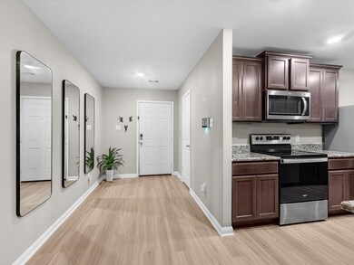 As you walk in you are greeted with a wide hallway, perfect to create a drop zone and you have lots of storage with a coat closet to your left.
