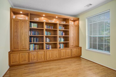 Formal living room off the foyer boasts bamboo flo