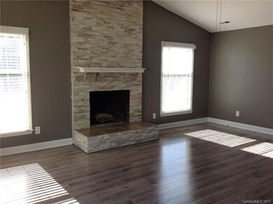 Massive great room with real masonry fireplace for