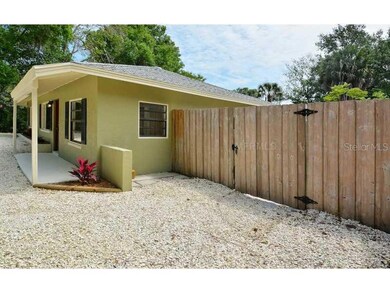 Exterior Front - Large gate to side and rear yards accessible by vehicle