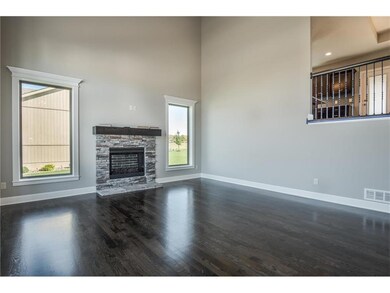 HARDWOOD FLOORING IS AN UPGRADE.  CARPET IN LIVING